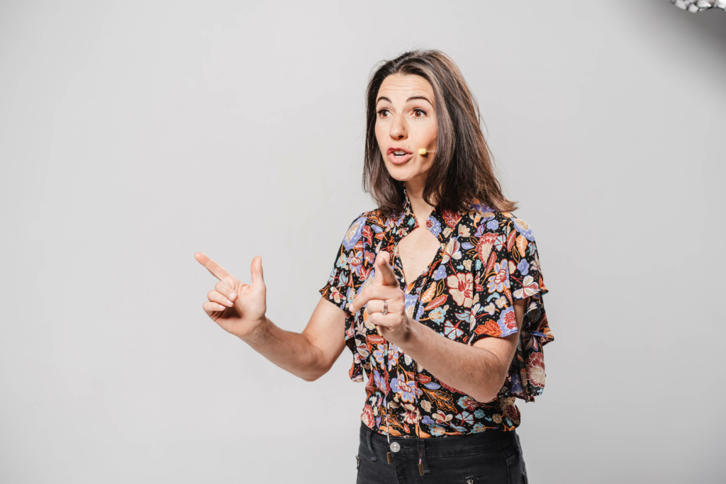 person speaking with a microphone