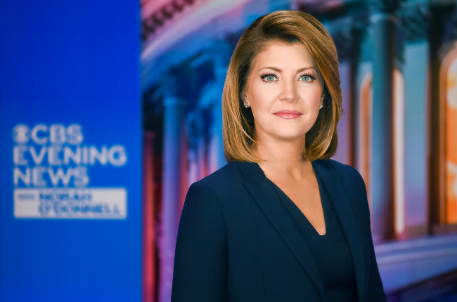 Norah O'Donnell in a dark blue blouse