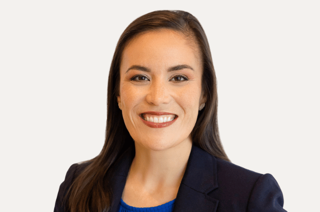 gina ortiz jones pictured smiling against a white background