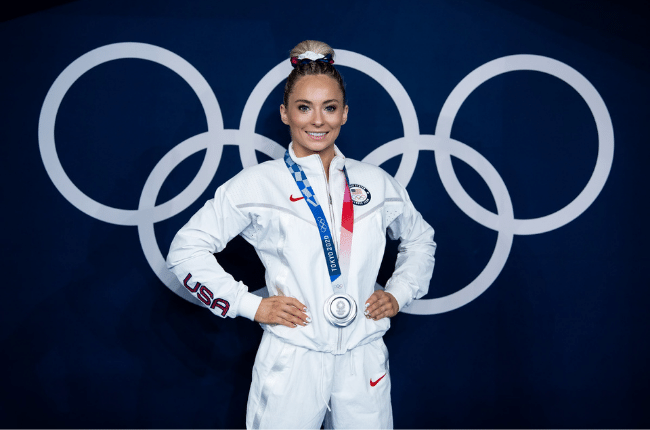 mykayla skinner posing with medal