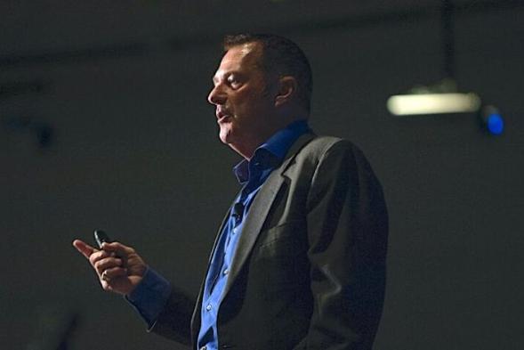 michael steep addressing the audience during a keynote